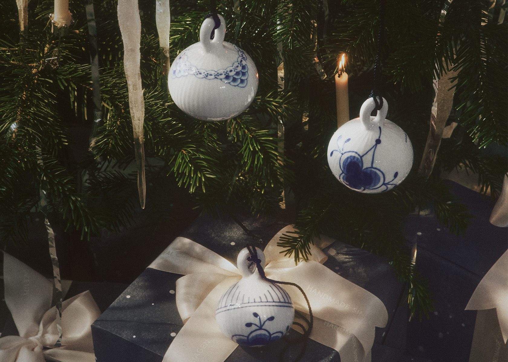 Christmas Baubles from Royal copenhagen hanging on a Christmas tree